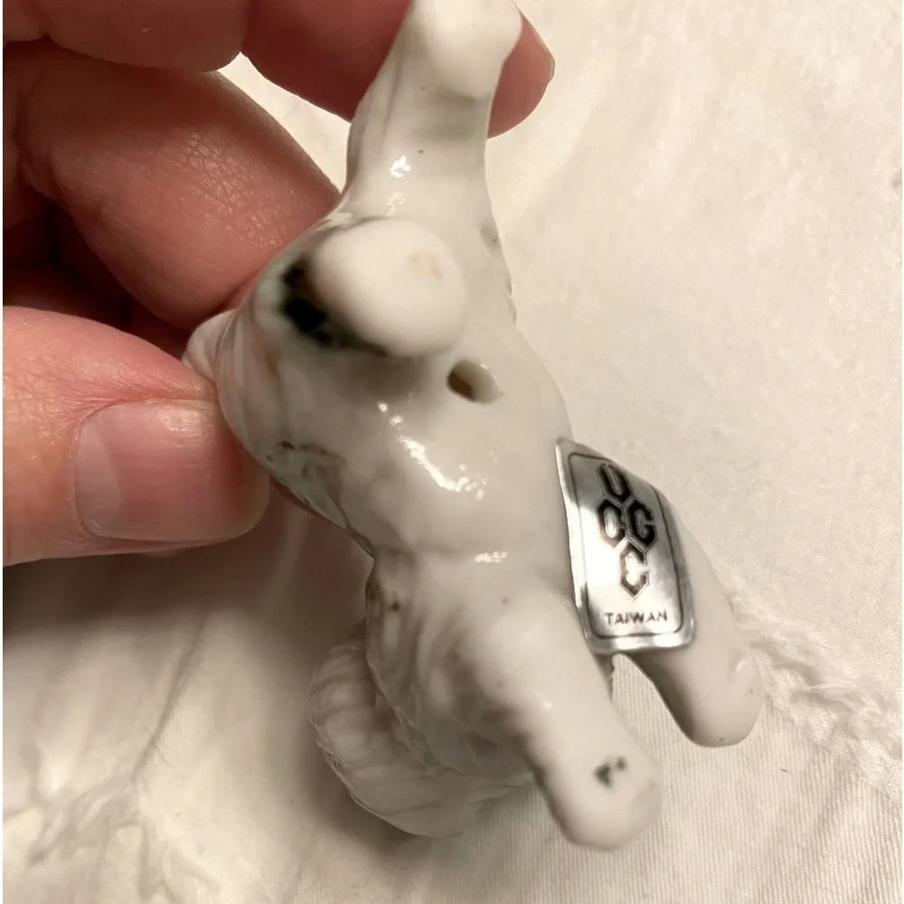 Porcelain cat shelf figurine Kitty shadow box approximately 2”.   #16